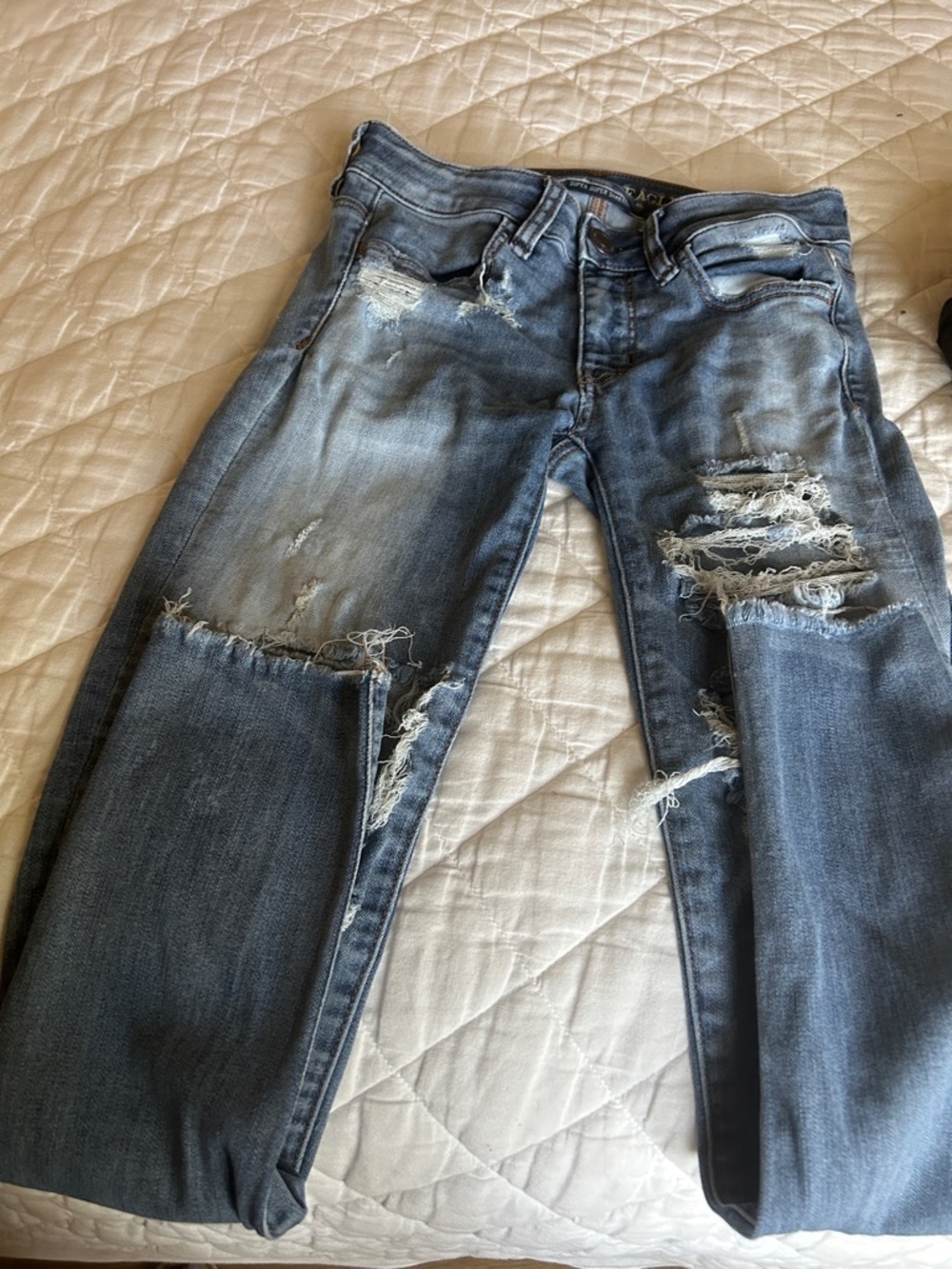 American Eagle Outfitters Distressed Light Blue Ripped Jeans